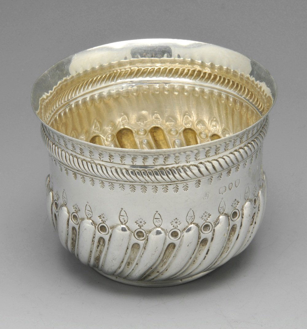 A small Victorian silver bowl & two Edwardian examples.: A small Victorian silver bowl with moulded girdle, lobed and fluted decoration to the lower body and coin inset to the base, hallmarked Charles Stuart Harris, London 1890, height measuring 2 1/2 inche