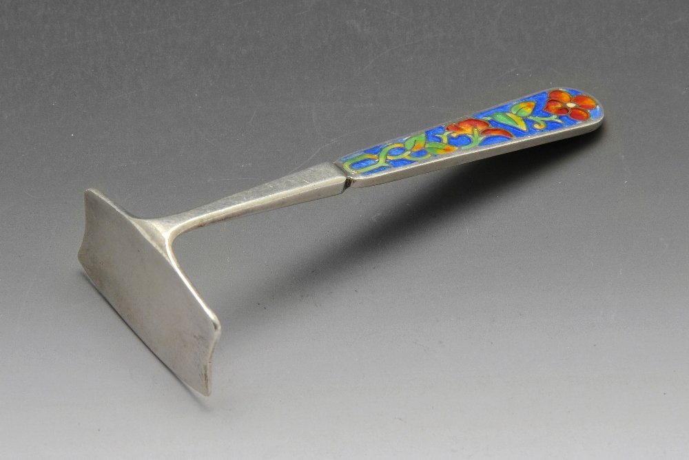 A 1920's child's silver pusher.: A 1920's child's silver pusher with enamelled terminal. Hallmarked Bernard Instone, Birmingham 1929. Length measuring 9 cm, weight 24.6 grams.