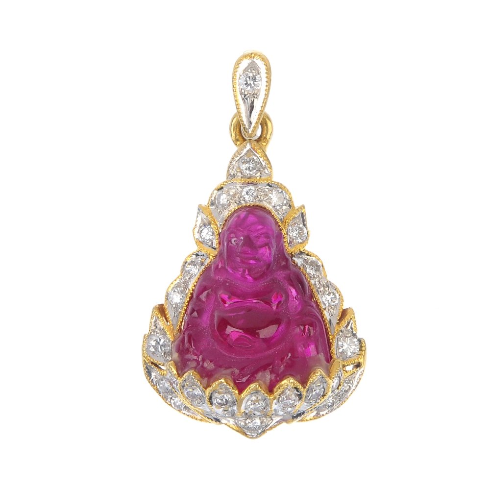A synthetic ruby and diamond Buddha pendant. (1 of 3)