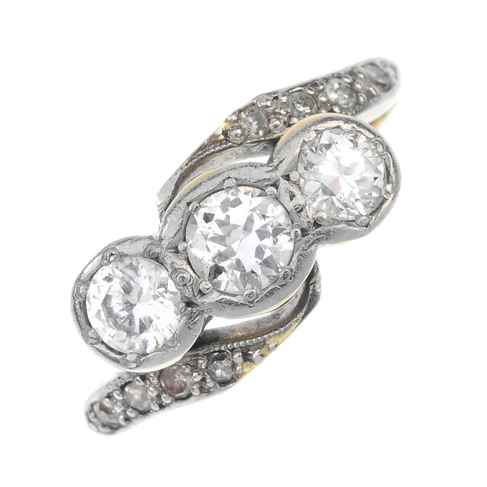 A diamond three-stone ring. (1 of 4)