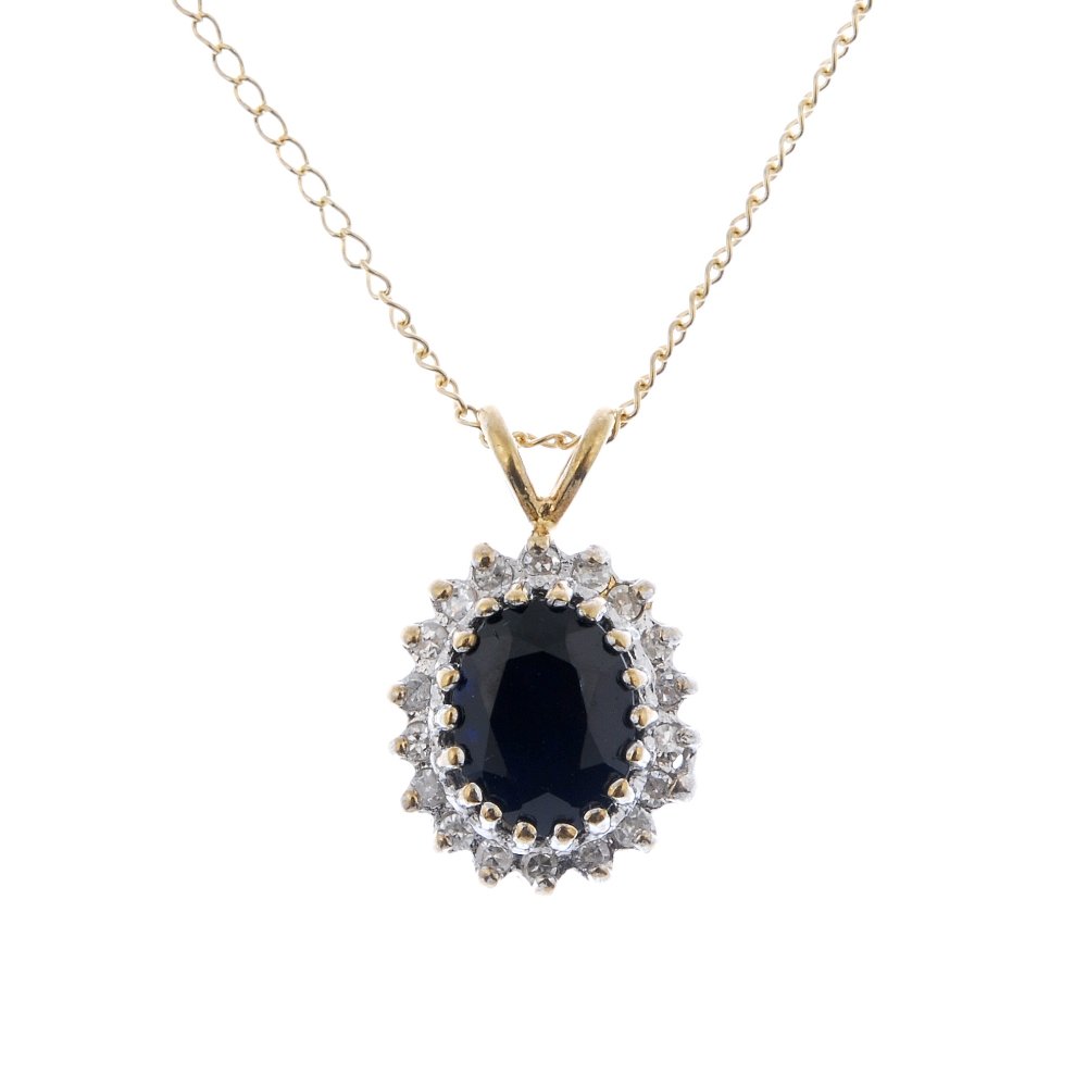 A sapphire and diamond cluster pendant and ear stud (1 of 3)