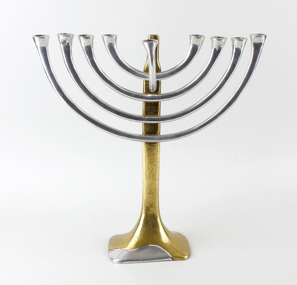 A David Marshall brass and aluminium menorah.: A David Marshall brass and aluminium menorah, the crescent branches raised upon plain stem leading to the two-tone base, marked beneath, 18.5" (47cm) high.