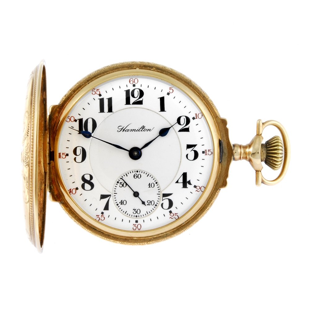 A full hunter pocket watch by Hamilton.: A full hunter pocket watch by Hamilton. Yellow metal case, stamped 14k, with floral design to case front and image of a deer to case back. Signed keyless wind full plate movement with club tooth lever