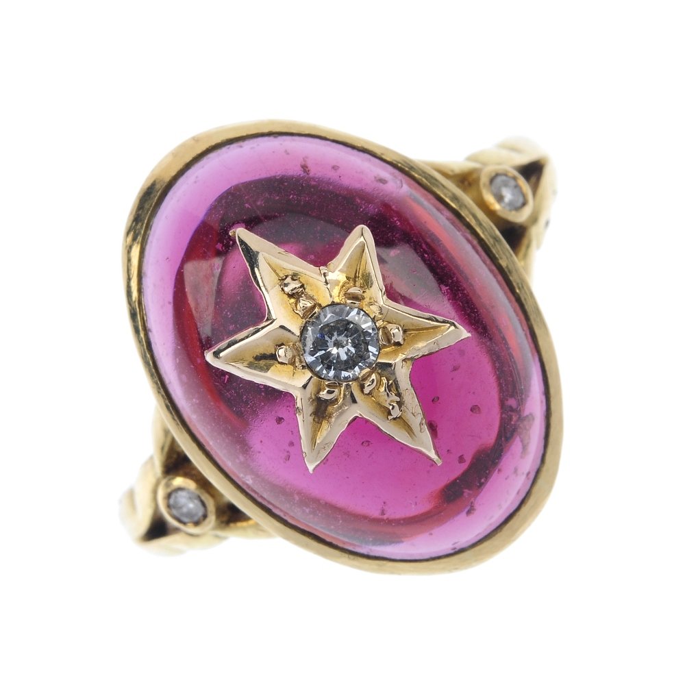 A garnet and diamond ring. (1 of 4)