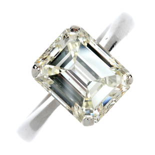 A diamond single-stone ring.: A diamond single-stone ring. The rectangular-shape diamond, weighing 4.73cts, to the tapered shoulders and plain band. Accompanied by report number 20022002, dated 11th February 2015, from AnchorCert,