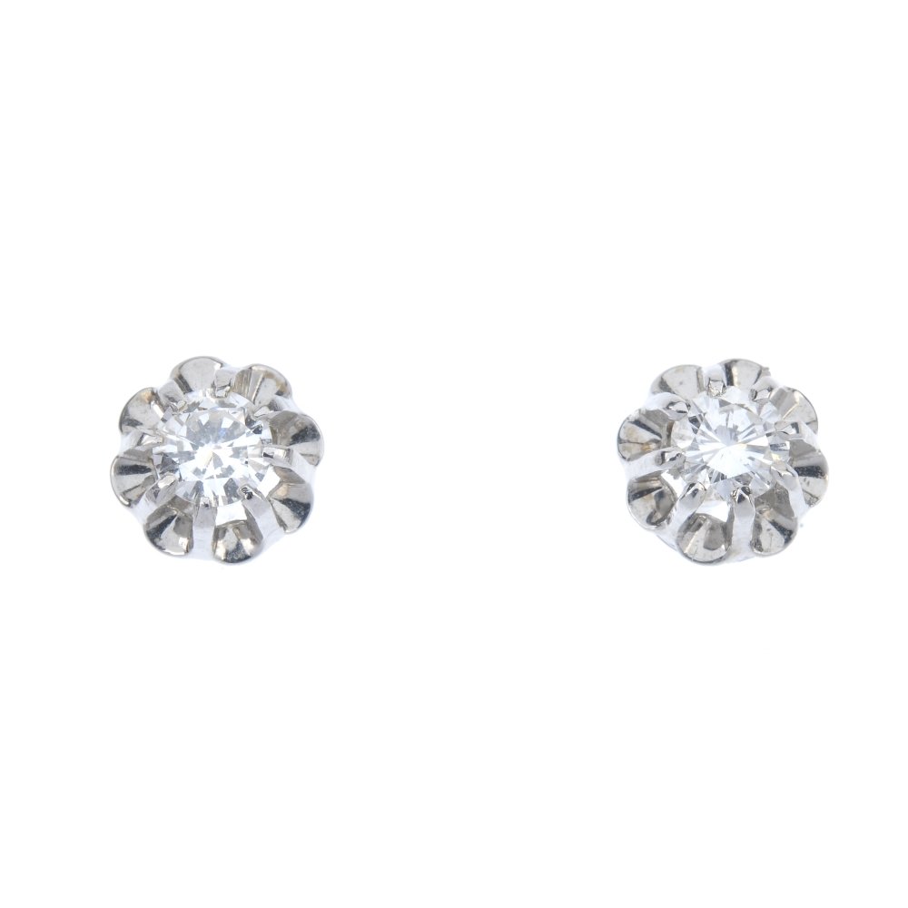 A pair of diamond ear studs. (1 of 2)