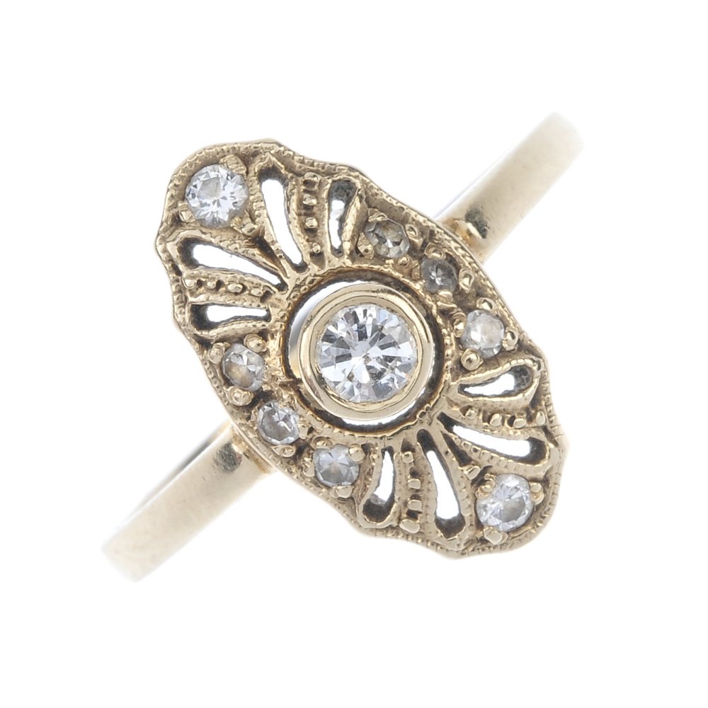 A diamond cluster dress ring. (1 of 4)