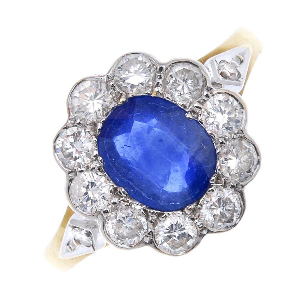 A sapphire and diamond cluster ring. (1 of 4)
