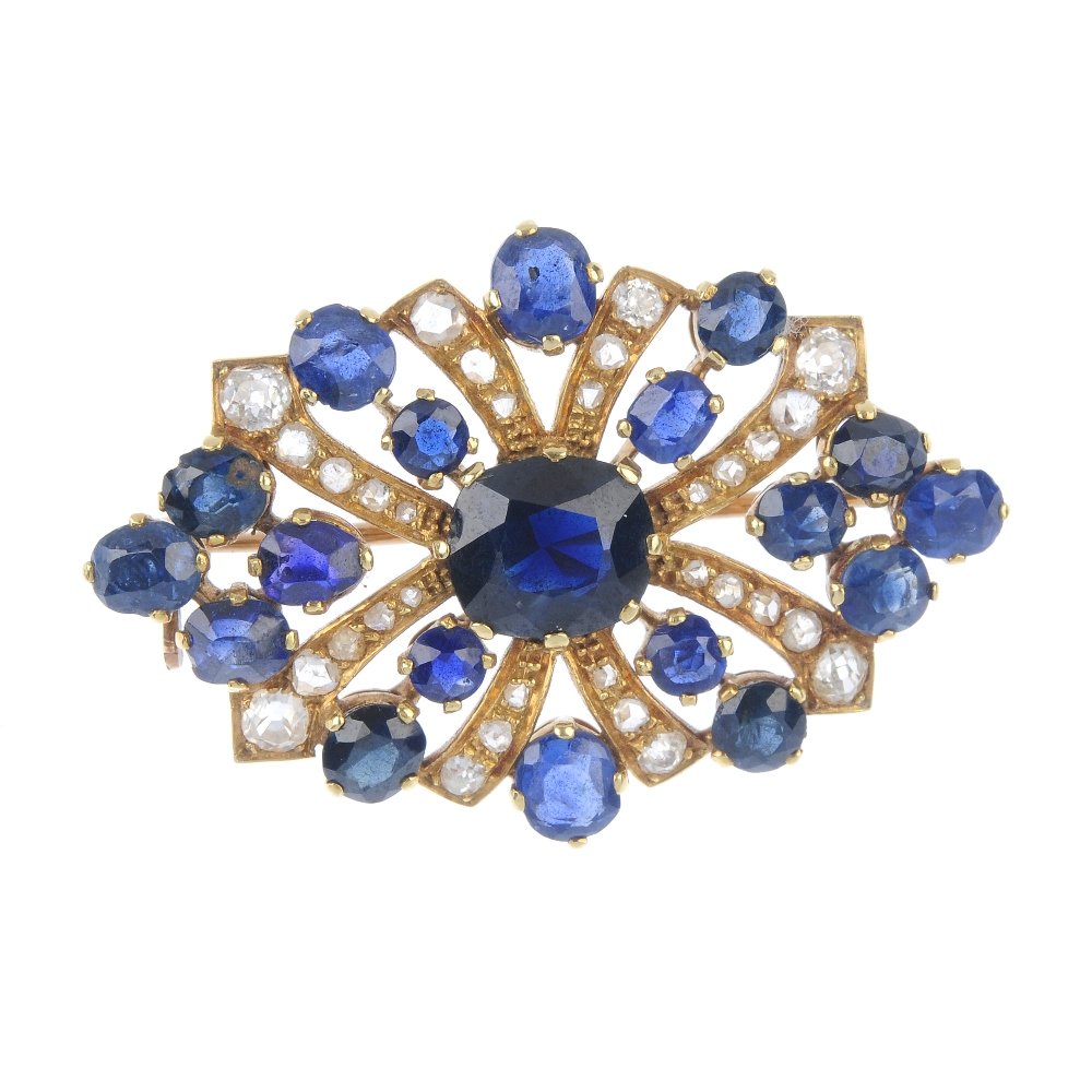A gold sapphire and diamond brooch. (1 of 2)