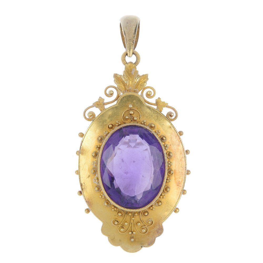 A late 19th century gold amethyst locket. (1 of 2)