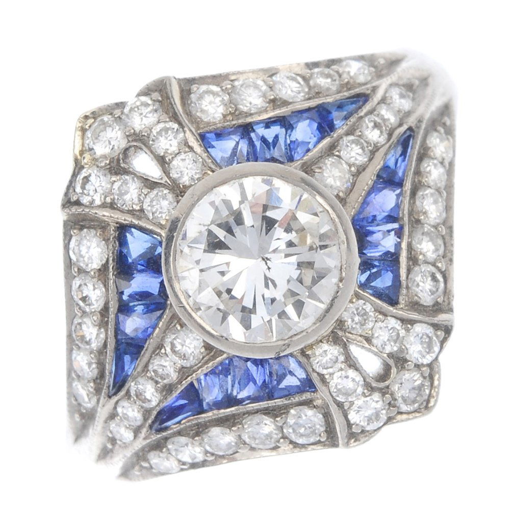 A sapphire and diamond dress ring. (1 of 4)