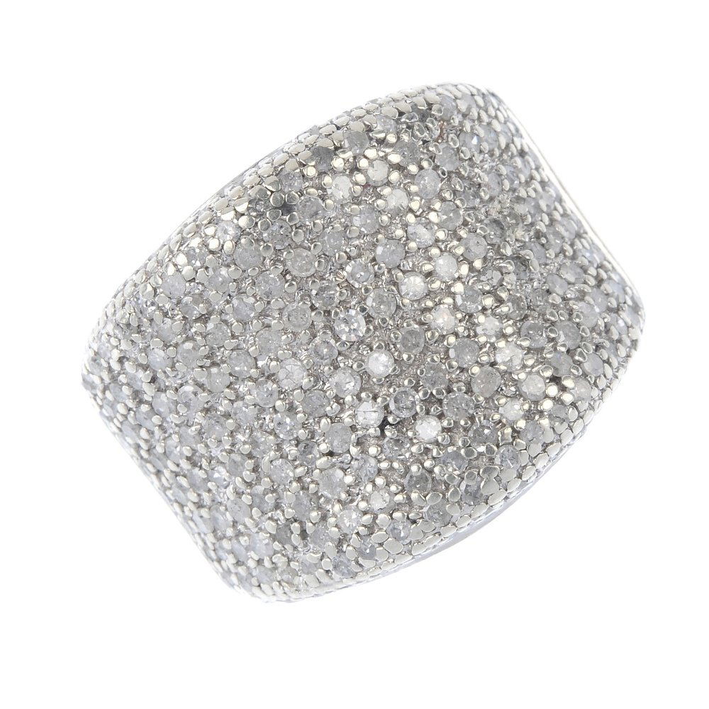 A 9ct gold diamond dress ring. (1 of 4)