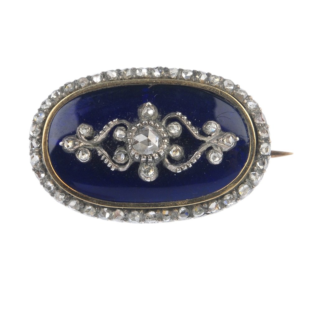 A mid Victorian enamel and diamond brooch. (1 of 2)