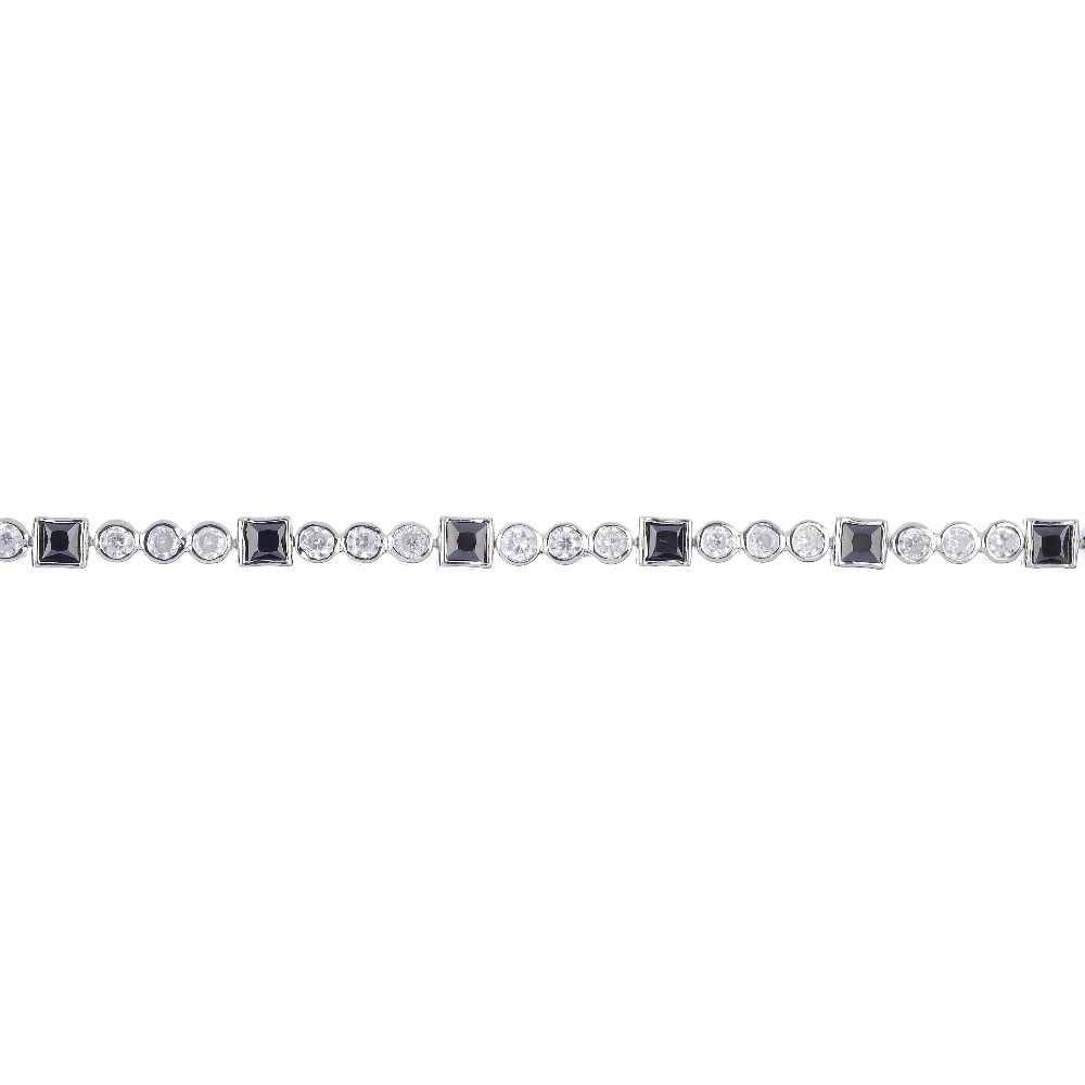 A selection of silver and white metal jewellery: A selection of silver and white metal jewellery. To include curb-link bracelets and necklaces, three cuff bangles and a Siam brooch. (22) Weight 500.2gms.