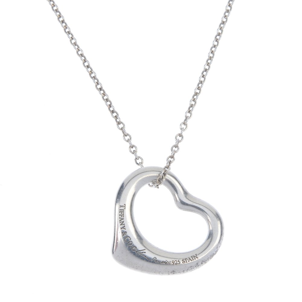 TIFFANY & CO. - a pendant by Elsa Perretti.: TIFFANY & CO. - a pendant by Elsa Perretti. Designed as an open heart to the belcher-link chain. Signed Tiffany and Peretti. Length 42cms. Weight 3gms.