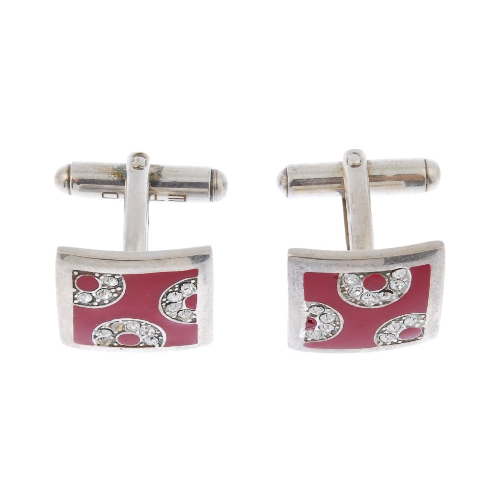 ETRO - a pair of enamel and paste white metal: ETRO - a pair of enamel and paste white metal cufflinks. Each designed as a square-shape red enamel panel, with circular-shape paste curved line detail, to the hinged back-fitting. With maker's mark.
