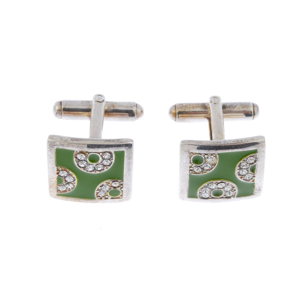 ETRO - a pair of enamel and paste white metal: ETRO - a pair of enamel and paste white metal cufflinks. Each designed as a square-shape green enamel panel, with circular-shape paste curved line detail, to the hinged back-fitting. With makerr's mar