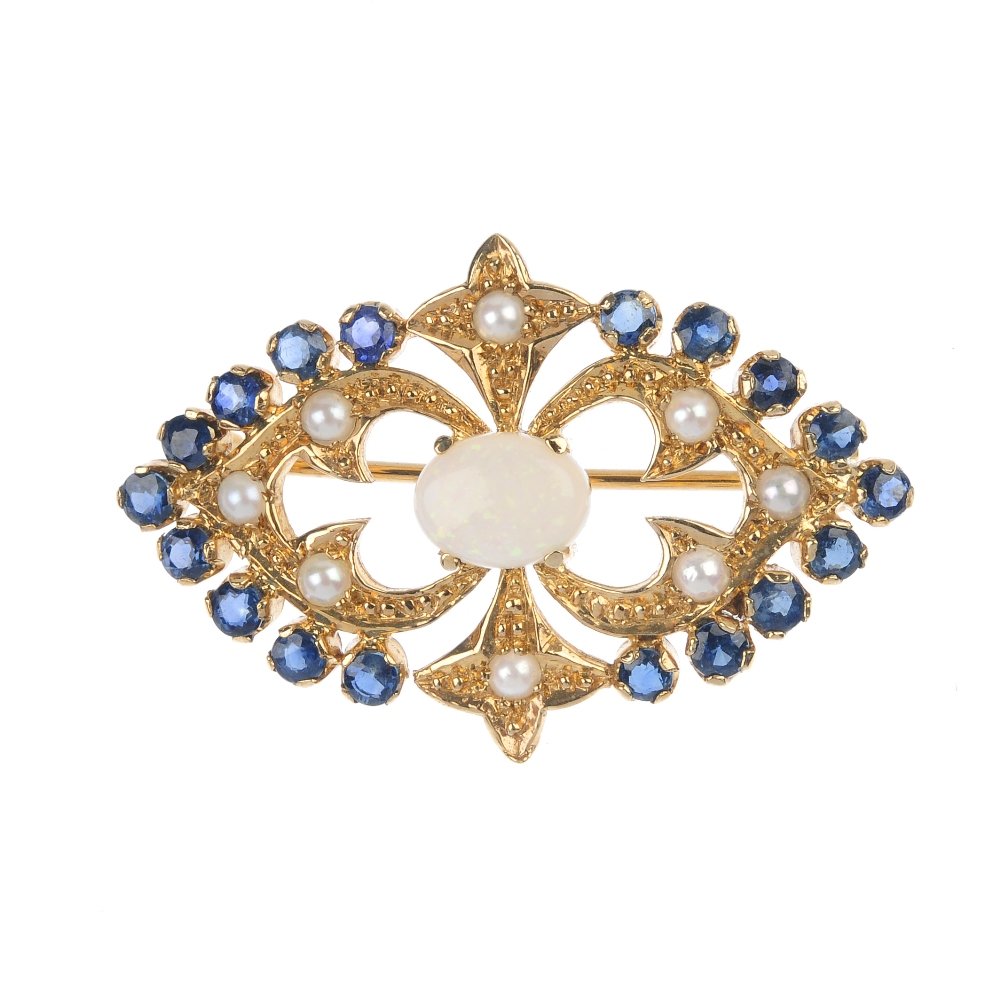 A 9ct gold gem-set brooch. (1 of 2)