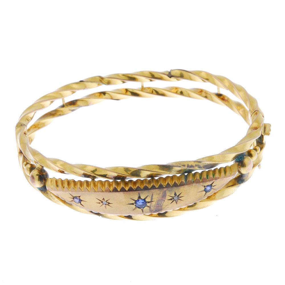 A late Victorian 9ct gold diamond and sapphire hinged (1 of 1)