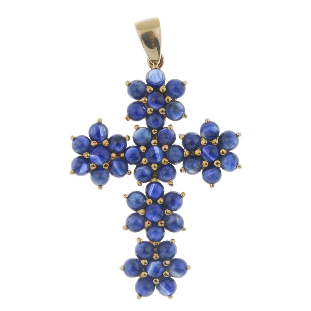 A 9ct gold sapphire cross pendant. (1 of 1)