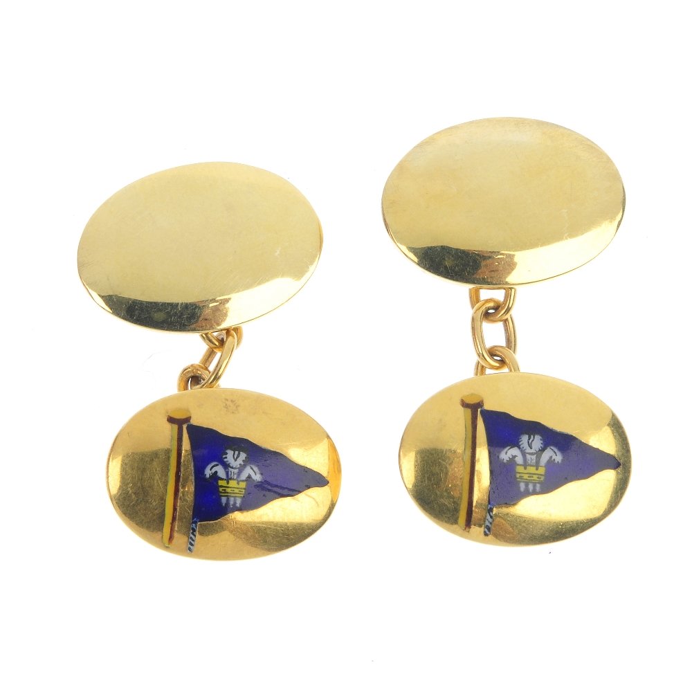A pair of 9ct gold enamel cufflinks. (1 of 2)