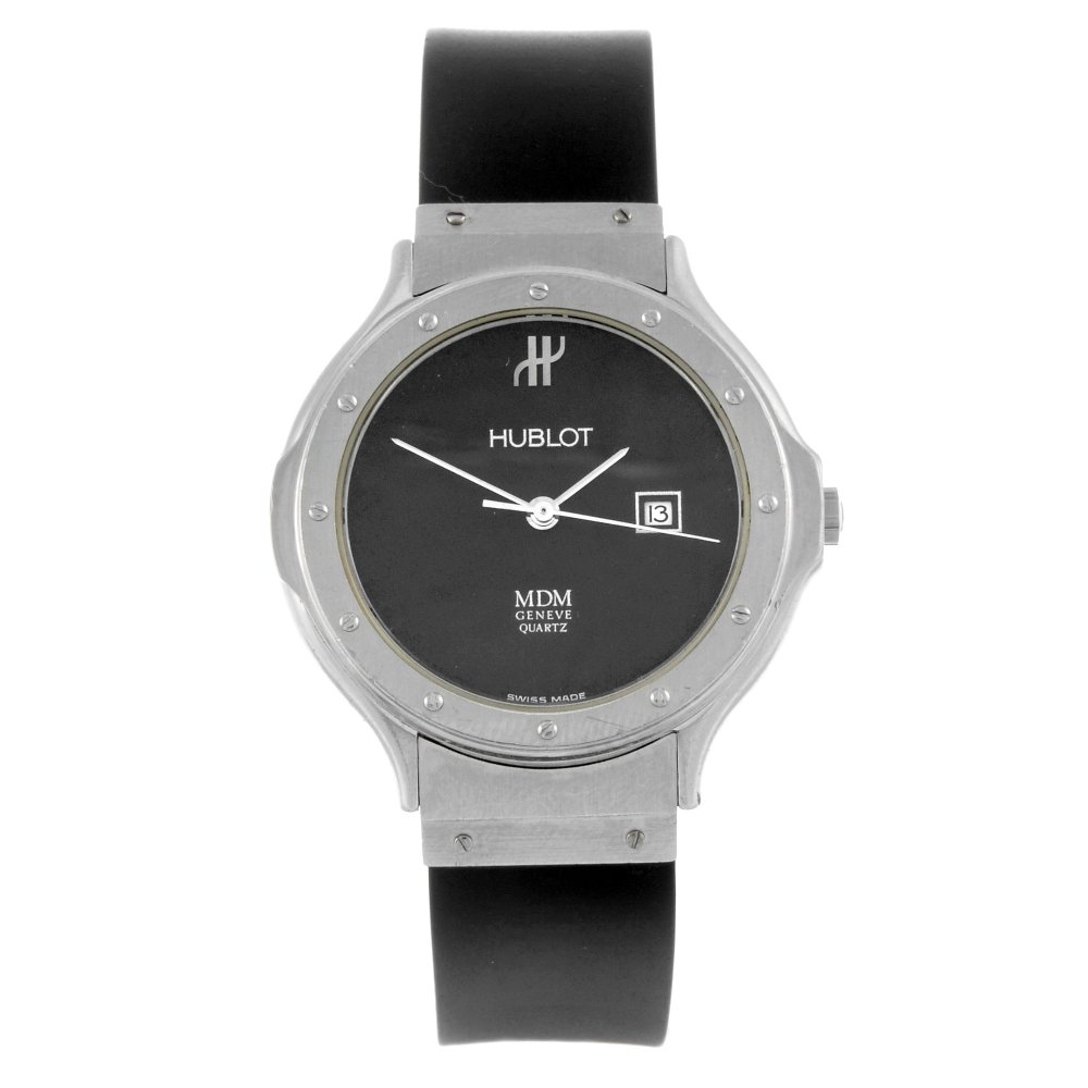 HUBLOT - a lady's stainless steel MDM wrist watch.: HUBLOT - a lady's MDM wrist watch. Stainless steel case. Numbered 65451. Signed quartz movement with quick date set. Black dial with date aperture to three. Fitted to a signed black rubber strap with 