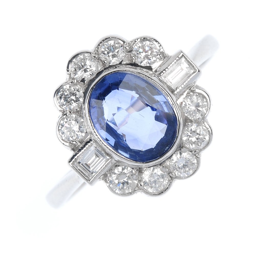 A sapphire and diamond cluster ring. (1 of 3)