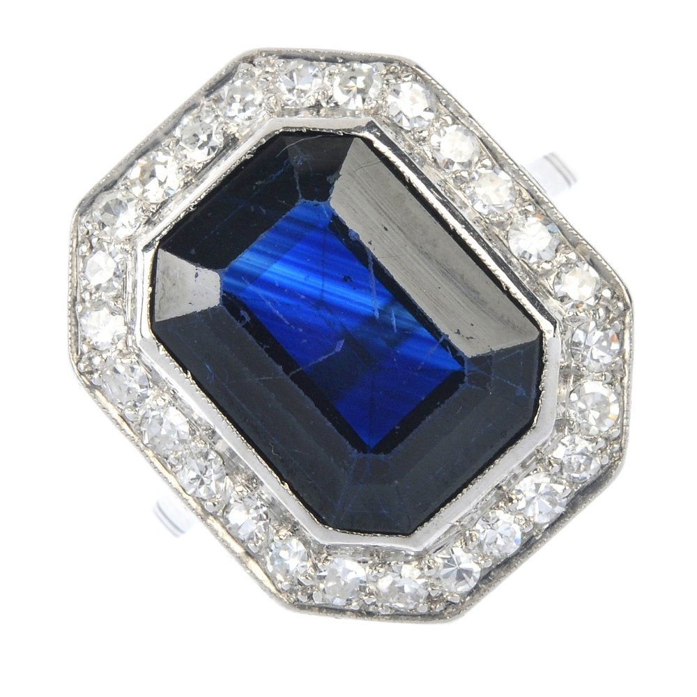A sapphire and diamond dress ring. (1 of 3)
