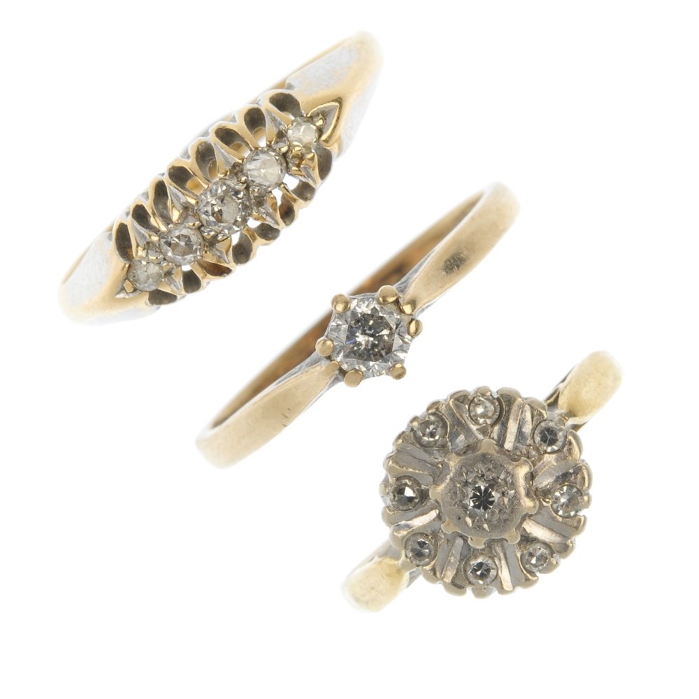 An assortment of five dress rings. (1 of 4)