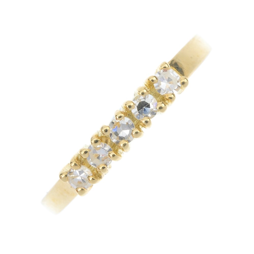 An 18ct gold diamond five-stone ring. (1 of 4)