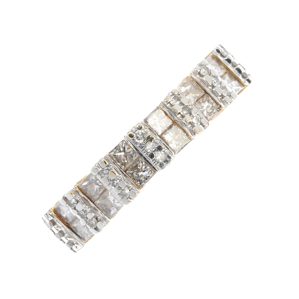 A 9ct gold diamond half eternity ring. (1 of 4)