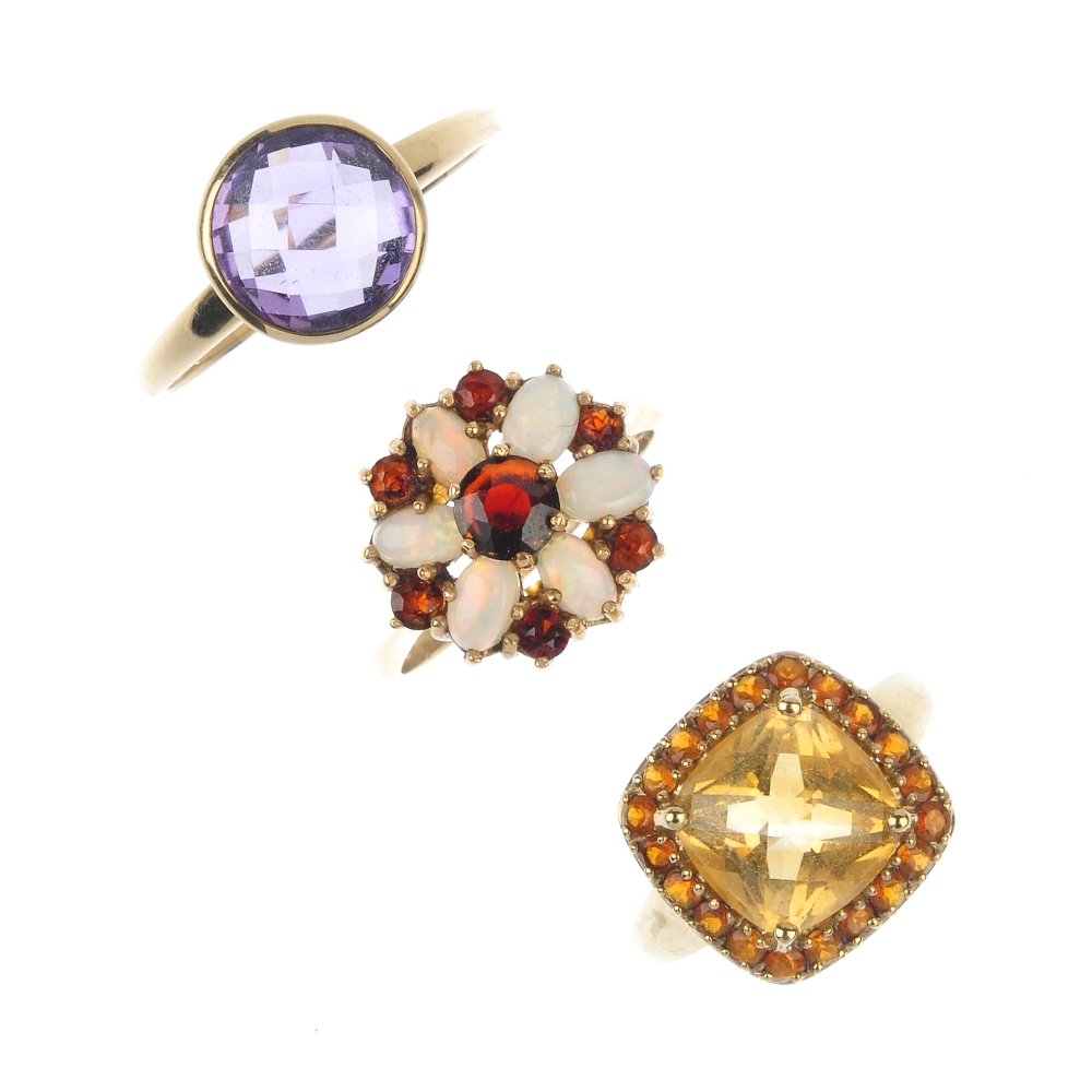 A selection of three gem-set rings. (1 of 4)