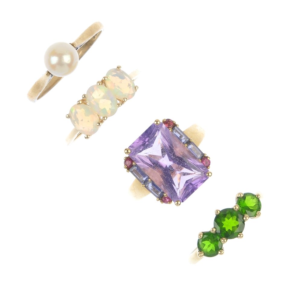 A selection of four gem-set rings. (1 of 4)