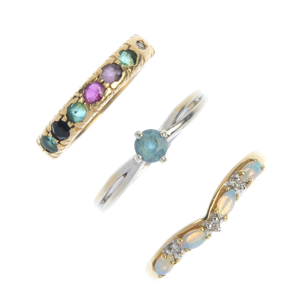 A selection of three 9ct gold gem-set rings. (1 of 4)