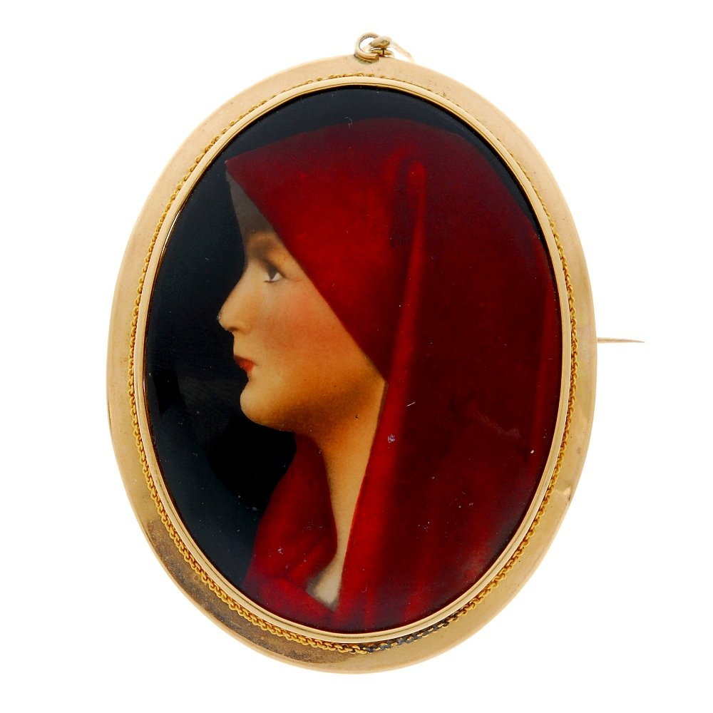 A mid 20th century enamel portrait brooch. (1 of 2)