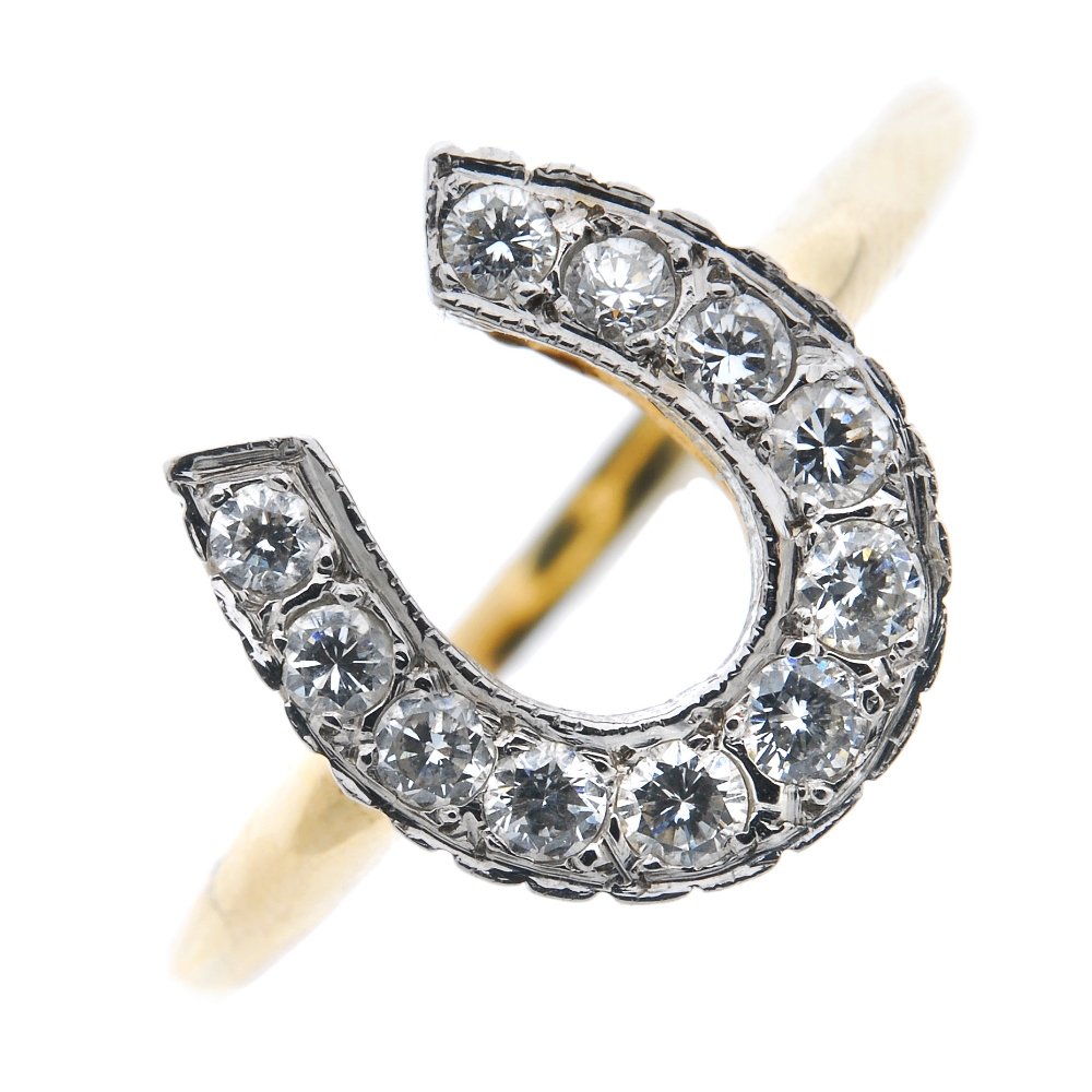 A diamond horseshoe ring. (1 of 2)