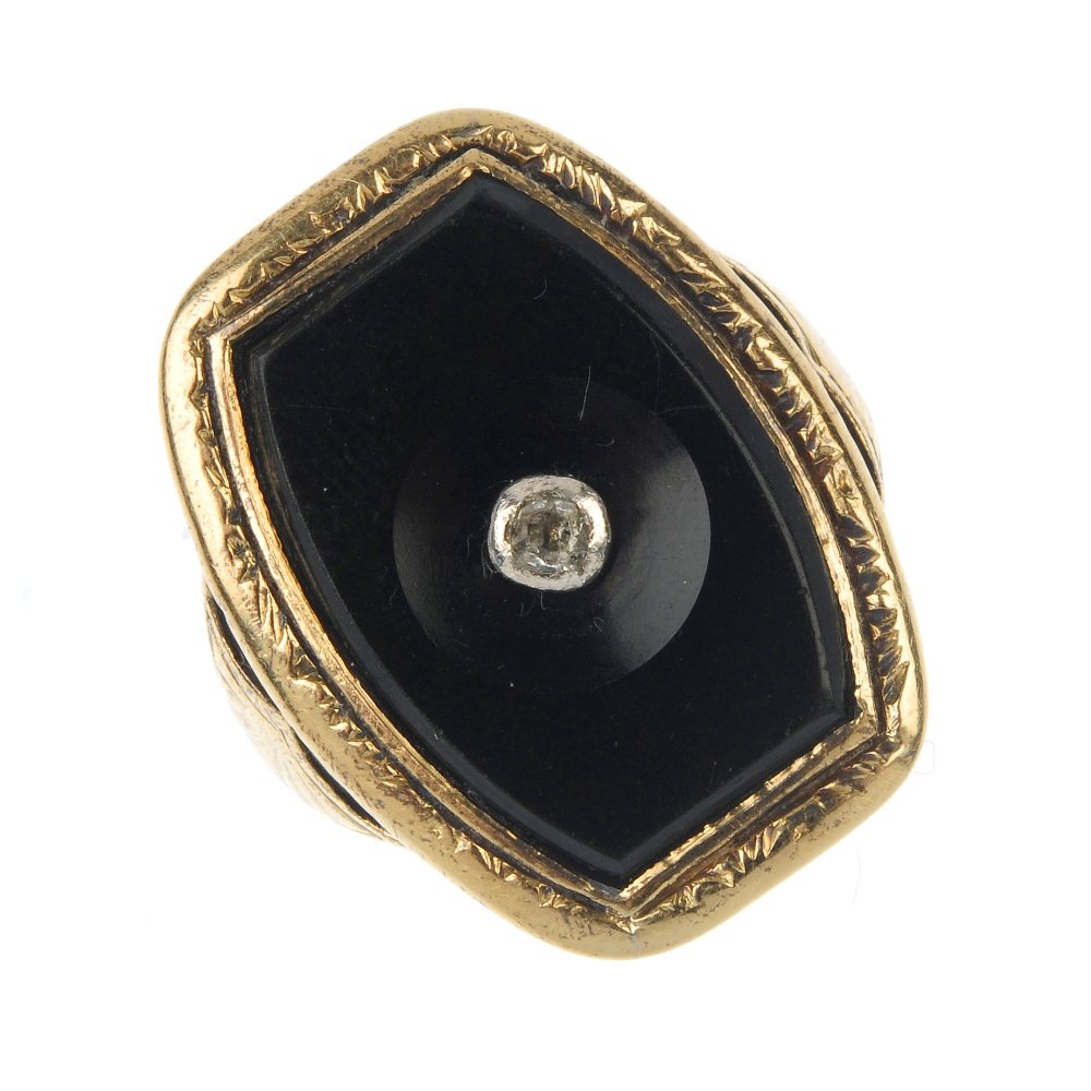 An onyx and diamond dress ring. (1 of 3)