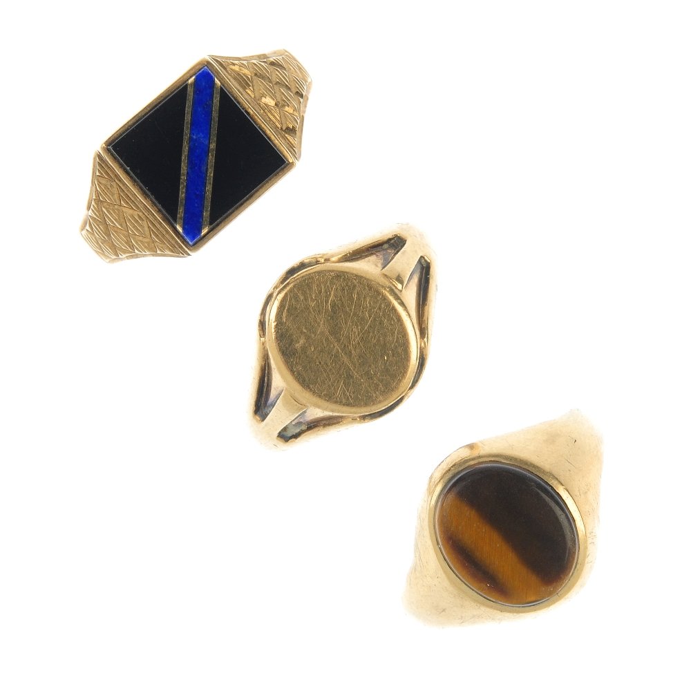 A selection of three 9ct gold signet rings. (1 of 4)