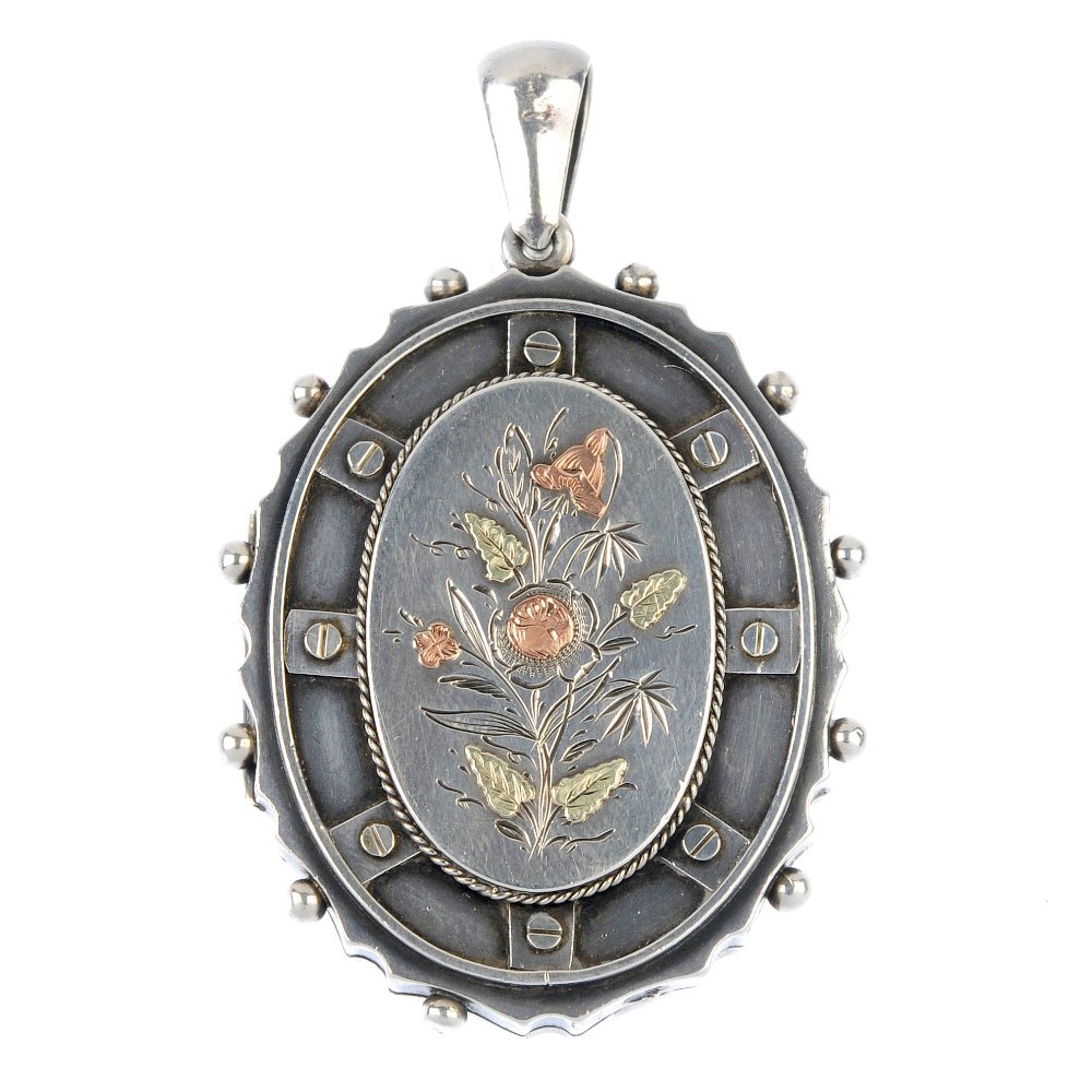 A late Victorian silver locket. (1 of 3)