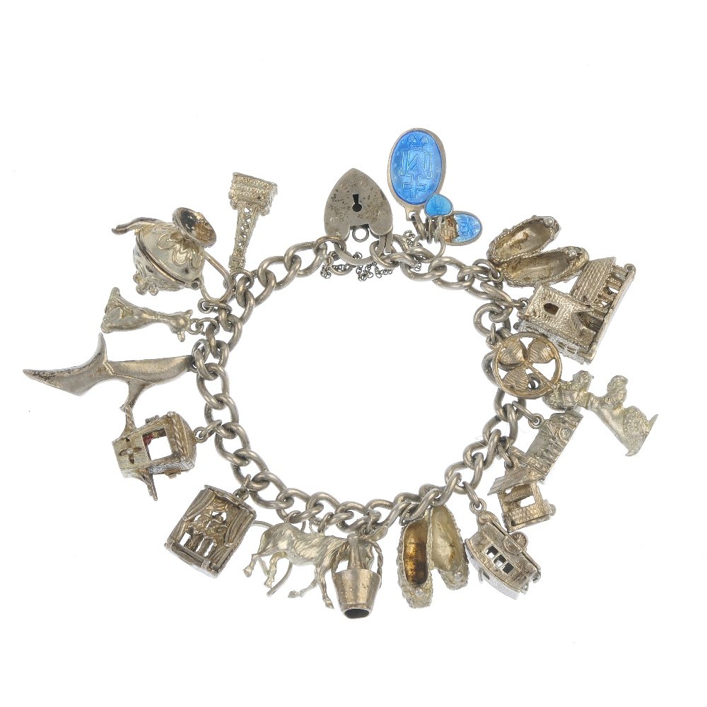 Four charm bracelets and some loose charms.: Four charm bracelets and some loose charms. The curb, double-curb and belcher-link bracelets suspending a total of eighty-eight charms, to include a cocktail shaker, a caravan, a carousel and a furthe