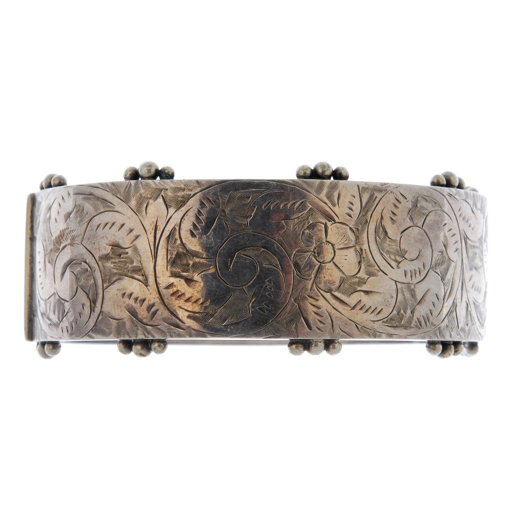 A late Victorian silver hinged bangle. (1 of 2)
