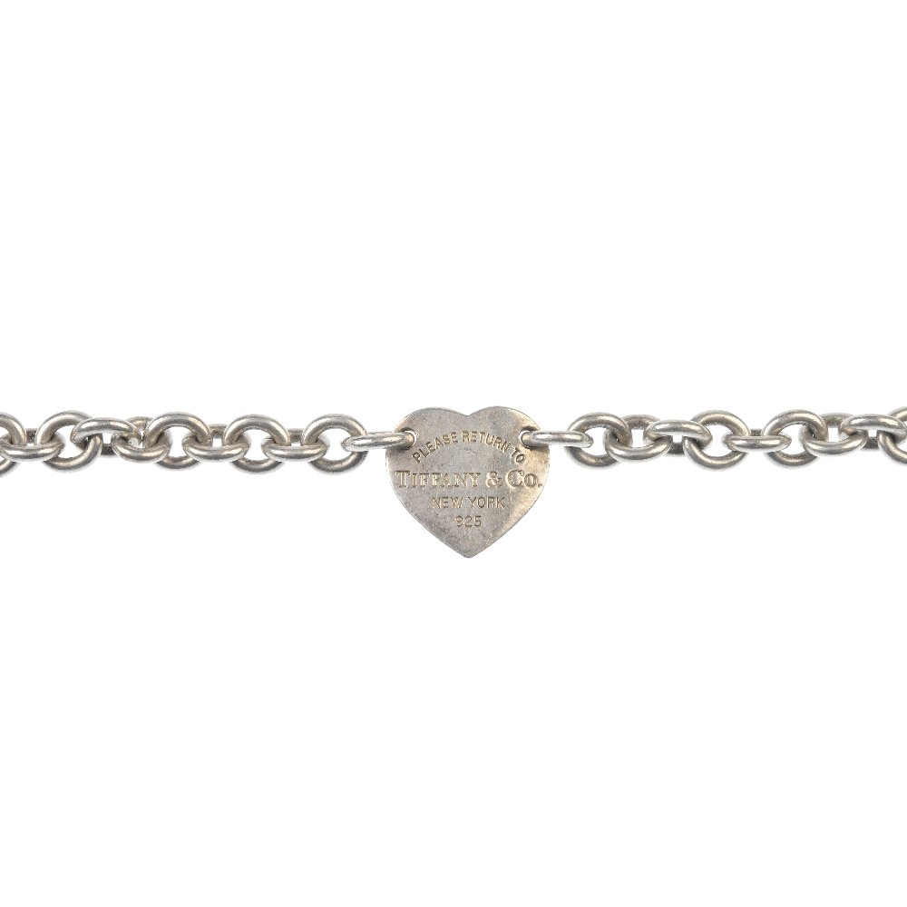 TIFFANY & CO. - a silver 'Return to Tiffany' bracelet. (1 of 2)