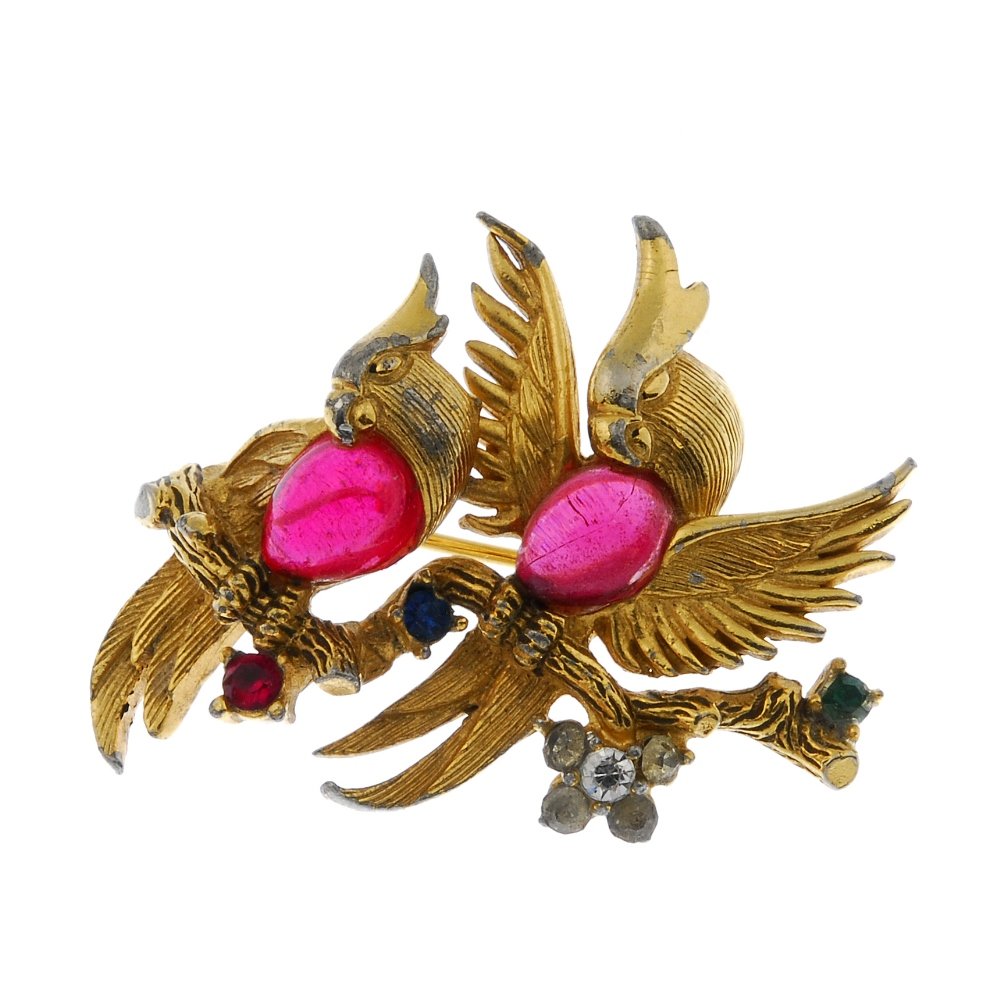 A selection of designer costume jewellery.: A selection of designer costume jewellery. To include a brooch designed as a pink enamel flower, together with a heart-shape pin cushion box, the red velvet pad to the lid. (21) Lengths 1.5 to 22cms.