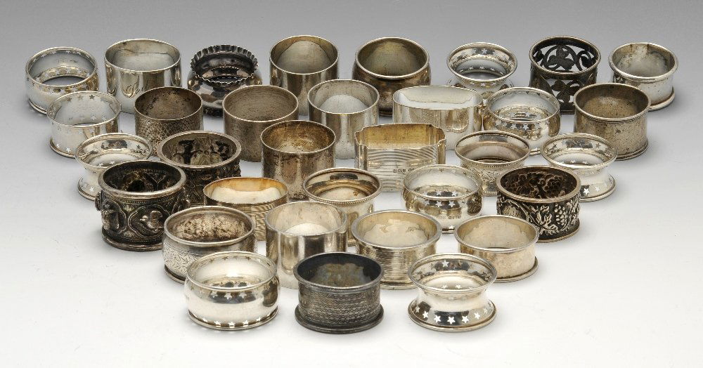 A selection of thirty three assorted napkin rings. (1 of 5)