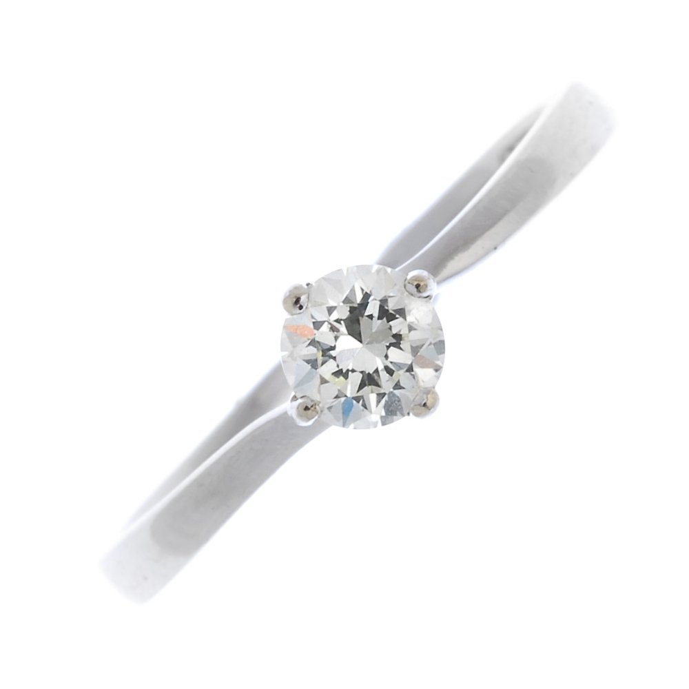 An 18ct gold diamond single-stone ring. (1 of 5)