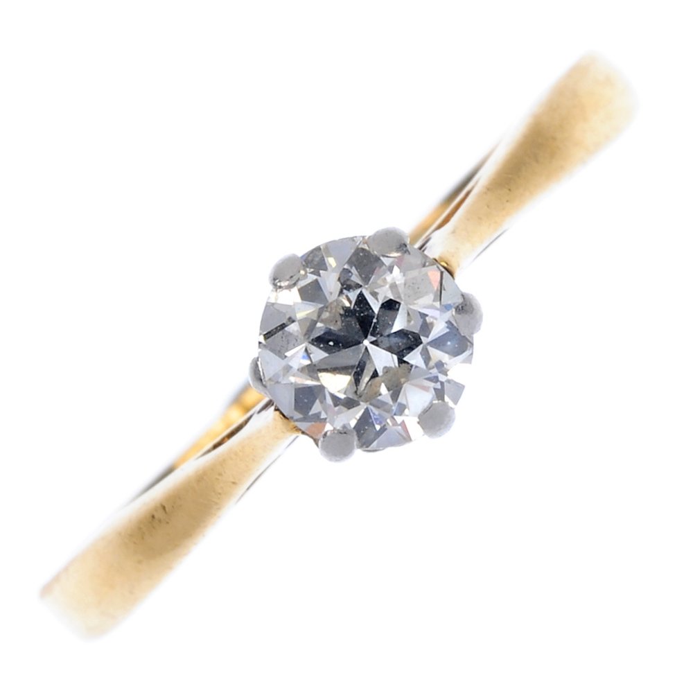 A diamond single-stone ring. (1 of 4)