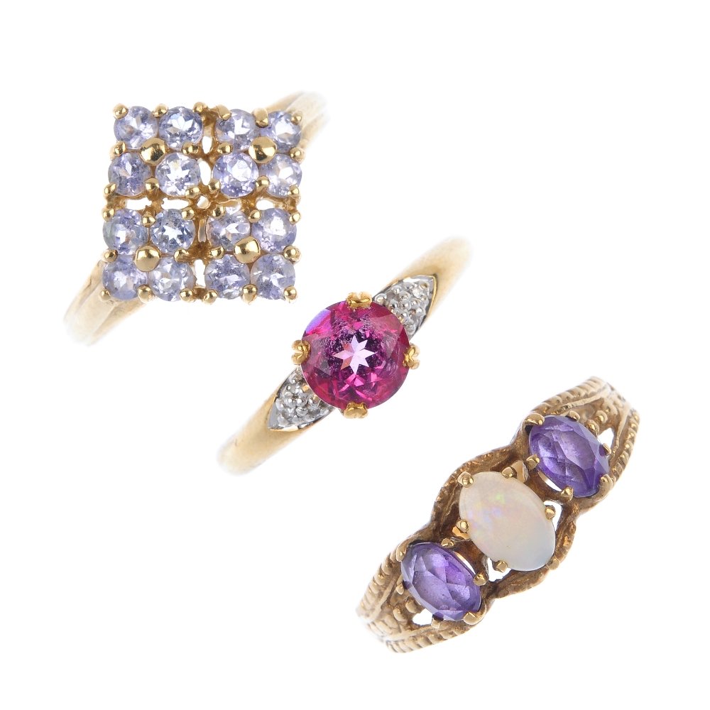 A selection of three 9ct gold gem-set rings. (1 of 4)
