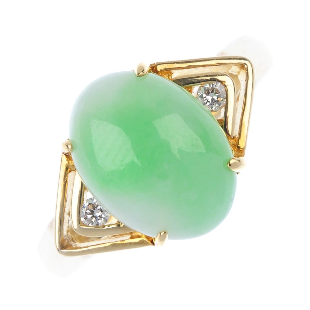 A jade and diamond three-stone ring. (1 of 4)