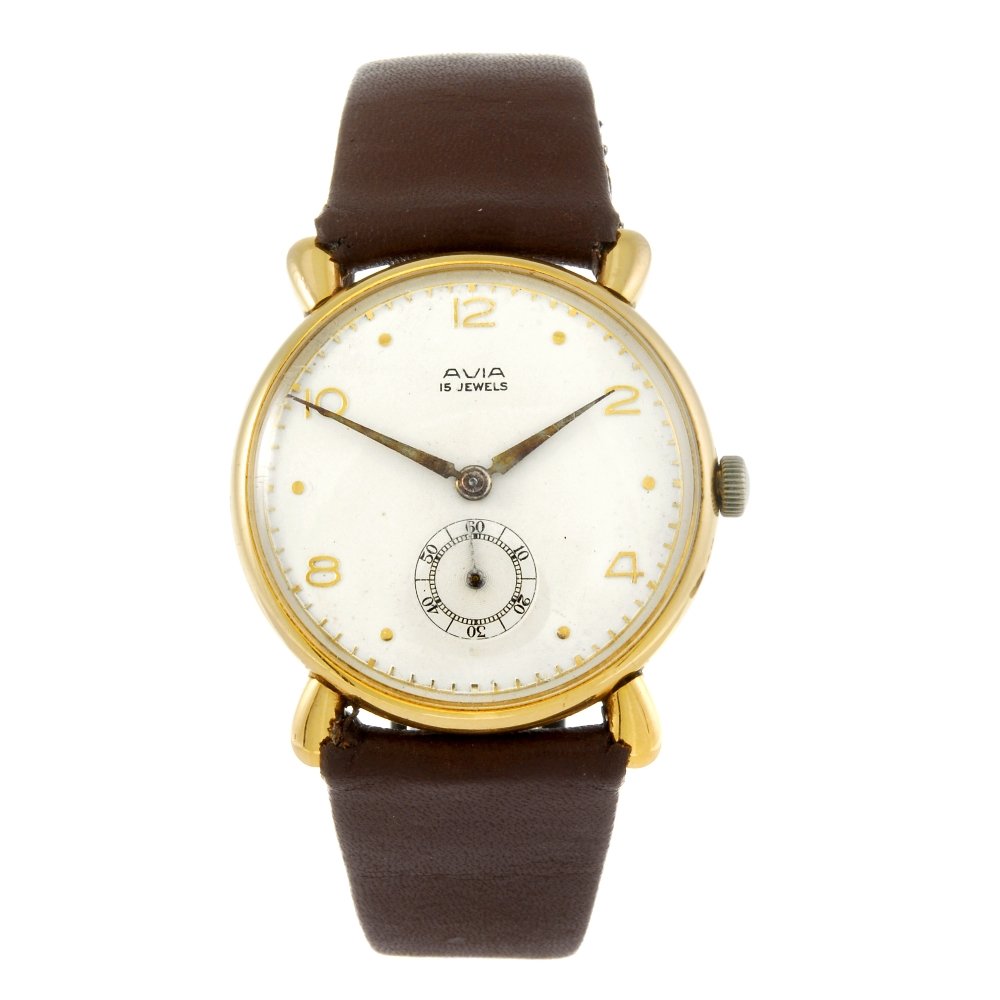 AVIA - a gentleman's yellow metal wrist watch.: AVIA - a gentleman's wrist watch. Yellow metal case, stamped 18K 0.750 with poincon. Unsigned manual wind movement. Silvered dial with alternating Arabic numeral and dot hour markers, subsidiary secon