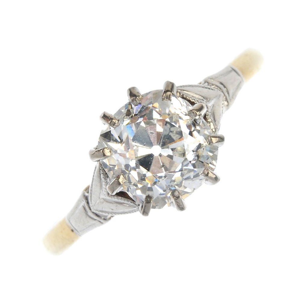 A diamond single-stone ring. (1 of 4)